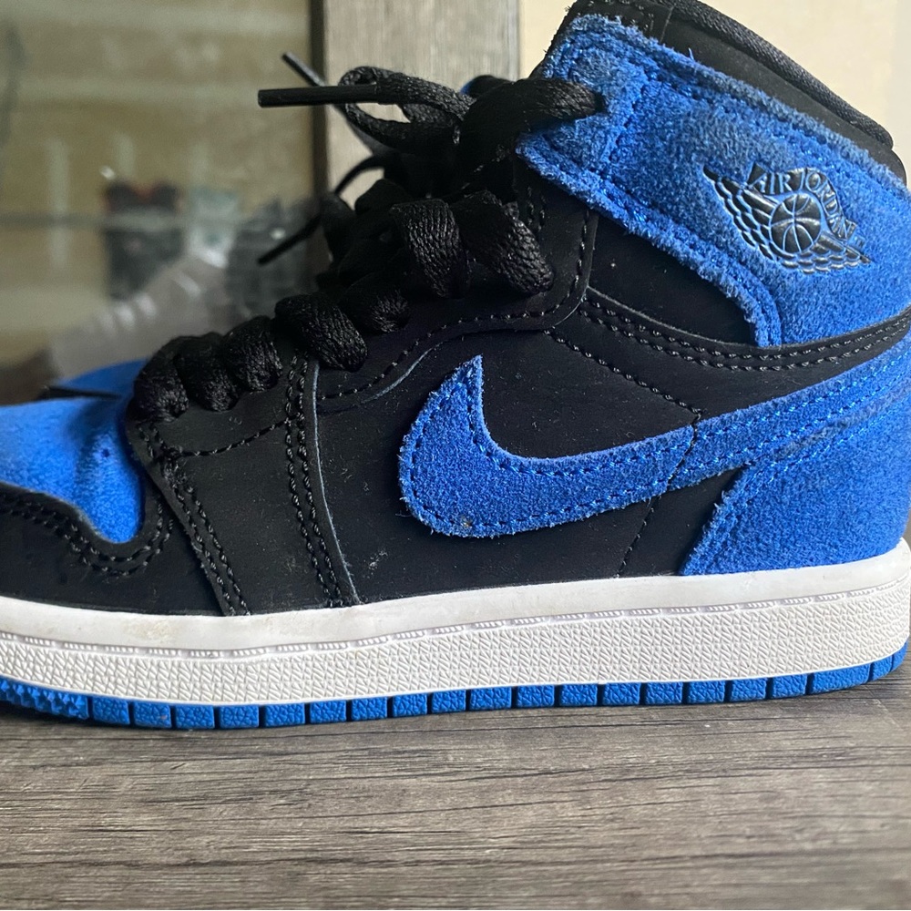 Nike Air Jordan Black and Blue High Tops